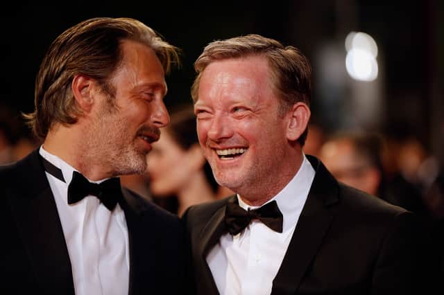 Mads Mikkelsen and Douglas Henshall laugh ahead of their film The Salvation being screened during the 67th edition of the Cannes Film Festival.