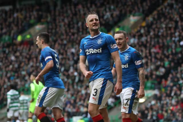Clint Hill celebrates his late goal at Celtic Park in 2017. Cr. Getty Images.
