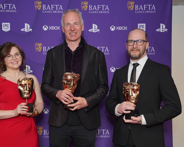 Sarah Baylus, Swen Vincke and David Walgrave who won Best Game Award with Baldur's Gate 3 at the Bafta Games Awards. Image: Jonathan Brady/PA Wire 
