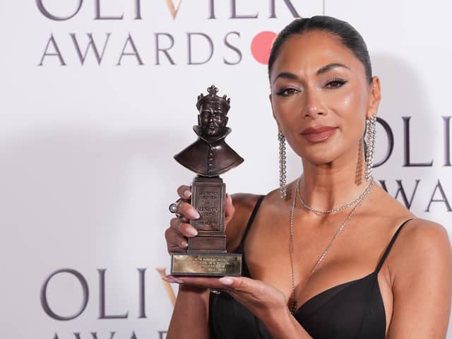 Nicole Scherzinger in the press room after being presented with the Best Actress in a Musical award at the Olivier Awards. 