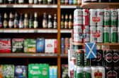 MSPs on a Holyrood committee have been urged to increase the minimum unit price (MUP) on alcohol to 65p. Image: Jane Barlow/PA Wire