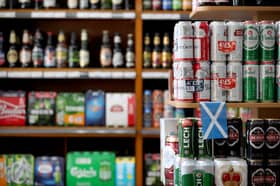 MSPs on a Holyrood committee have been urged to increase the minimum unit price (MUP) on alcohol to 65p. Image: Jane Barlow/PA Wire