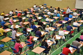 Students sitting an exam, as the first assessments start this week. Picture: PA