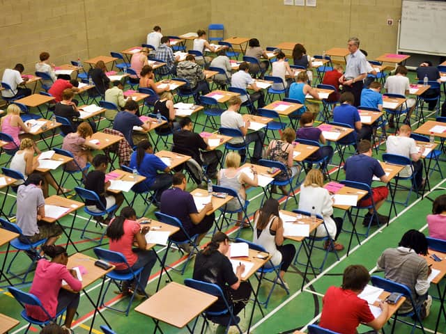 Students sitting an exam, as the first assessments start this week. Picture: PA