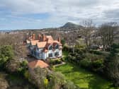 1 Cheylesmore at 67 Dirleton Avenue benefits from beautiful views over to the coast and is surrounded by almost an acre of well-maintained gardens.