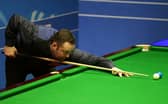 Scotland's Stephen Mcguire has reached the quarter finals of the World Snooker Championships.