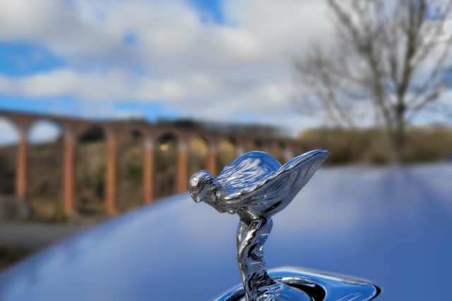 The Spirit of Ecstacy stands proud on the bonnet of the Rolls-Royce Spectre. Credit: Matt Allan