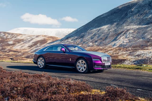 The Rolls-Royce Spectre at home amongst heather and hills. Credit: Matt Allan