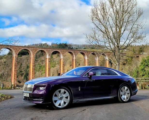 The Rolls-Royce Spectre parked near Leaderfoot Viaduct . Credit: Matt Allan