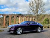 The Rolls-Royce Spectre parked near Leaderfoot Viaduct . Credit: Matt Allan