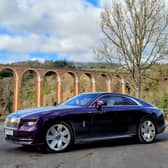 The Rolls-Royce Spectre parked near Leaderfoot Viaduct . Credit: Matt Allan