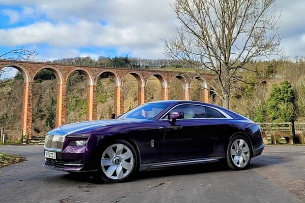 The Rolls-Royce Spectre parked near Leaderfoot Viaduct . Credit: Matt Allan