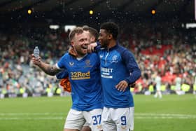 Former Rangers player Scott Arfield and Amad Diallo celebrate a 2-1 win over Celtic at Hampden Park in 2022. Cr. Getty Images.