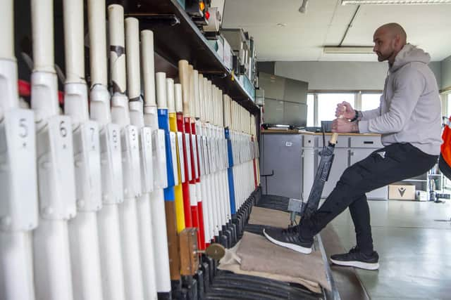 Signaller Gordon McCabe pulling a signal lever in Stanley Junction signal box. (Photo by Lisa Ferguson/The Scotsman)