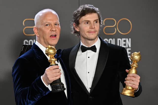 Ryan Murphy, left, posing with actor Evan Peters following wins during the Golden Globe Awards in 2023. Image: Getty