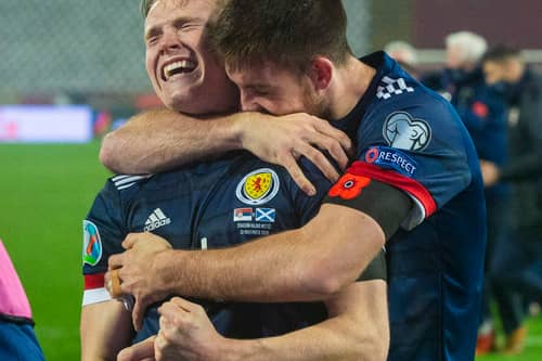 Declan Gallagher celebrates Scotland's qualification for Euro 2020 against Serbia. Cr. SNS Group.