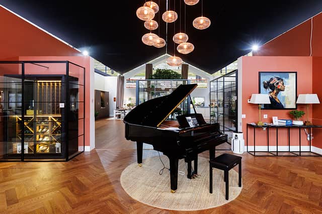 The grand piano and wine store make up the recipe for a perfect evening