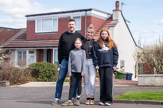 Homeowners Harry, Anna and their children Marley and Lexie outside  the 1960s Bungalow, Milngavie,