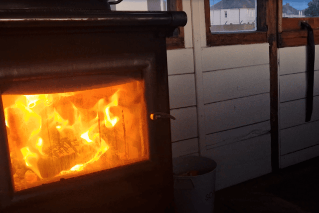 The wood burning stove inside the Victorian carriage