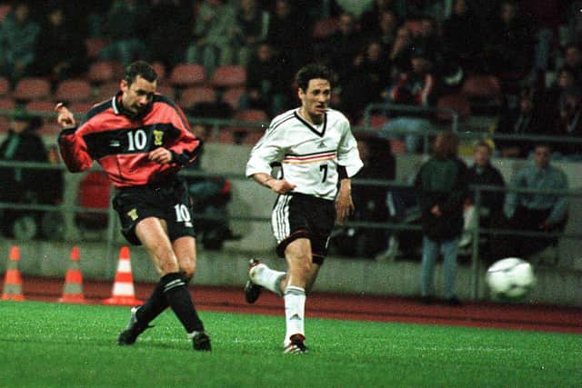 Don Hutchison slots home the winning goal in the 1999 friendly win over Germany - a game Didi Hamann started for the hosts. Cr. SNS Group.