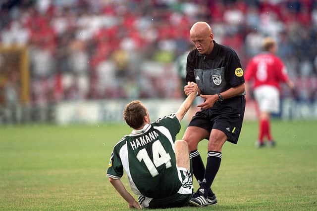 Didi Hamann is helped up by legendary referee Pierluigi Collina during the UEFA European Championships in 2020. Cr. Getty Images.
