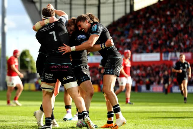 Glasgow Warriors' Sebastian Cancelliere celebrates after scoring his side's second try with Rory Darge and George Horne.