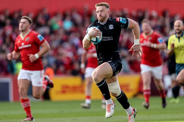 Kyle Steyn bursts clear to score Warriors' opening try.