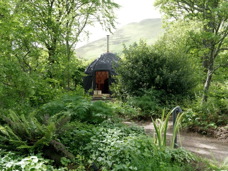 The woodland garden includes a Finnish-inspired steam sauna yurt.