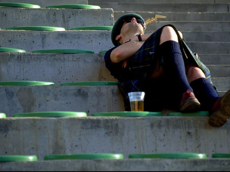 One Scotland fan catches some sleep before the opening game vs Morocco.
