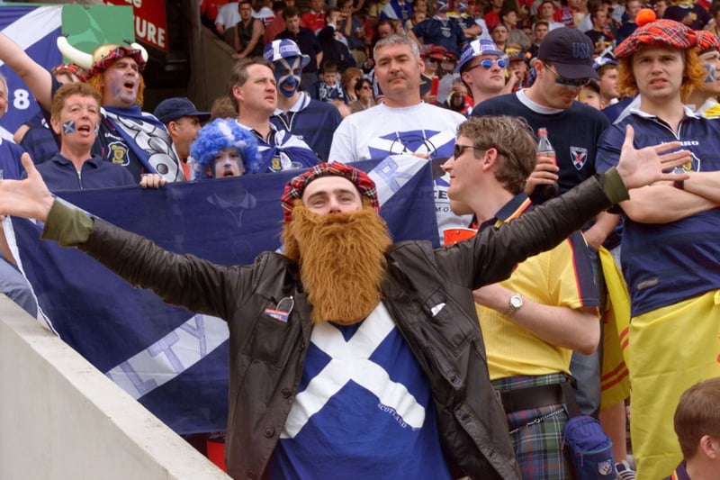 A Scottish supporter waves the Parc Lescure in Bordeaux before the 1998 World Cup game against Norway.