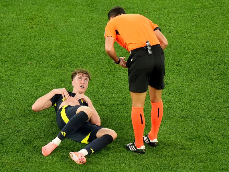 The centre-half was unflustered in the first half and had some nice moments on the ball. One big clearance in second half to deny a Hungarian chance. He was the guard constantly turning attacks away. Scotland's best player. 7