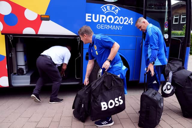 Scotland assistant manager John Carver is pictured leaving Scotland's Garmisch-Partenkirchen.