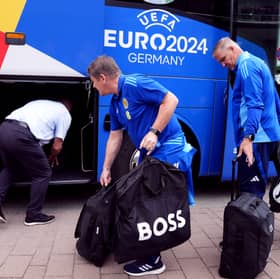 Scotland assistant manager John Carver is pictured leaving Scotland's Garmisch-Partenkirchen.