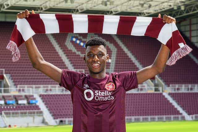 Musa Drammeh has signed a three-year deal with Hearts.