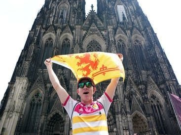 This fan flies the rampant lion outside of Kolner Dom.