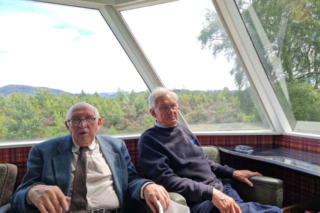 Railway historian Ian Lamb and Strathspey Railway volunteer David Childs in the observation car en route to Aviemore on June 20. (Photo by The Scotsman)