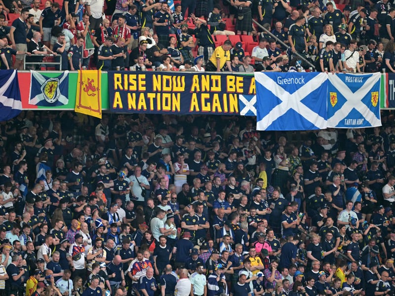 Scotland fans wave their flags ahead of the game against Hungary.