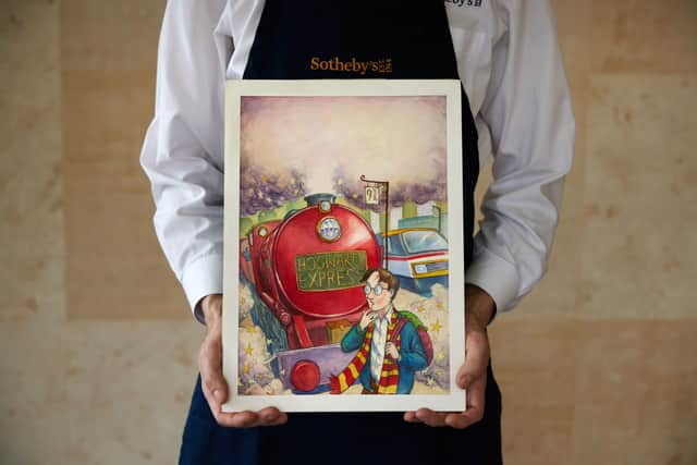 The original watercolour for Harry Potter And The Philosopher's Stone. The artwork for the cover of the first book in the series, by JK Rowling, fetched $1.9 million (£1.5m) at a sale by Sotheby's auction house in New York on Wednesday. Picture: Sotheby's/PA Wire