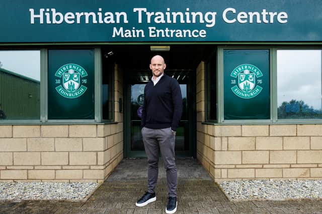 Gray stands outside the Hibs Training Centre.
