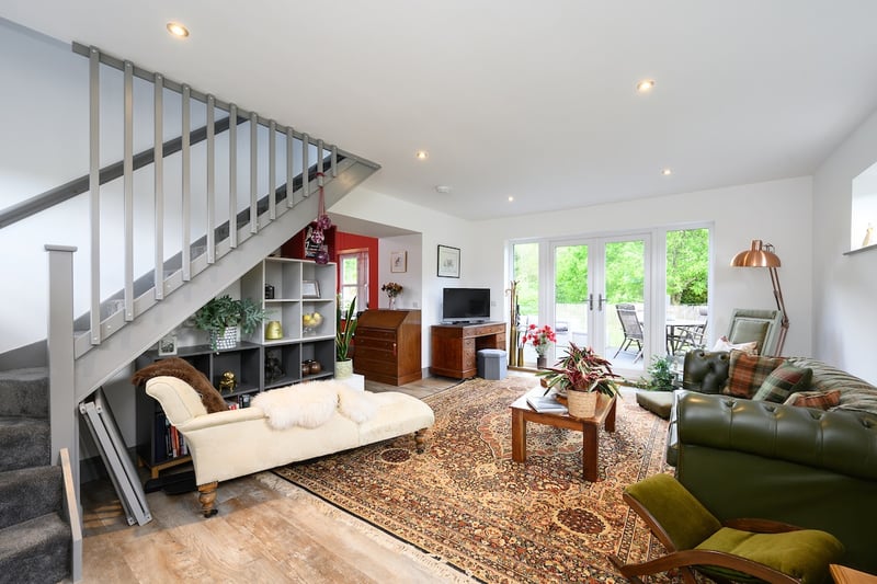 During the summer months the system also produces hot water via an immersion heater. The oil-fuelled Stanley stove in the kitchen provides heating and hot water in the winter,
and there is a back-up diesel generator.