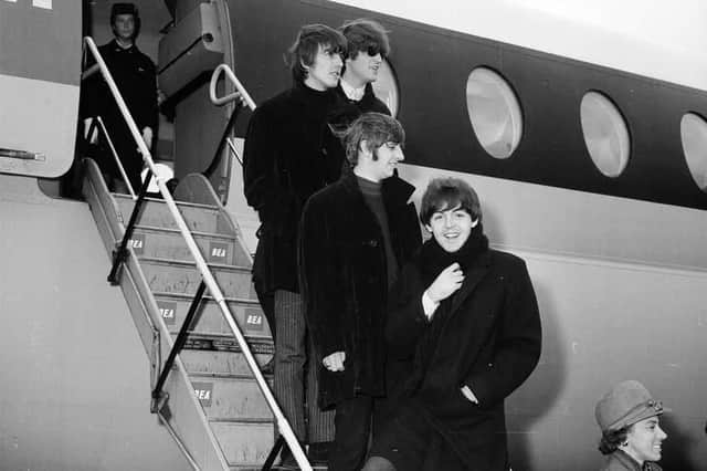 The Beatles arriving at Edinburgh Airport in October 1964 to play the ABC in Lothian Road. (Photo by The Scotsman)