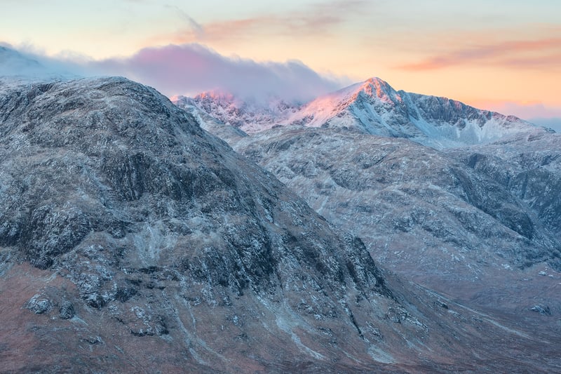 A photo of Bidean captured by Bulloch at sunrise. Bidean nam Bian is the highest peak in a group of mountains south of Glen Coe and north of Glen Etive in the Scottish Highlands. With a height of 1,150 metres, it is a Munro and the highest point in Argyll. 