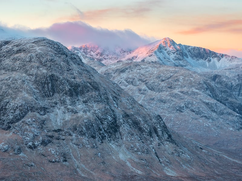 A photo of Bidean captured by Bulloch at sunrise. Bidean nam Bian is the highest peak in a group of mountains south of Glen Coe and north of Glen Etive in the Scottish Highlands. With a height of 1,150 metres, it is a Munro and the highest point in Argyll.