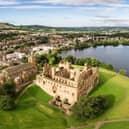 The skyline of Linlithgow, including the ruins of Linlithgow Palace and St. Michael's church from the air