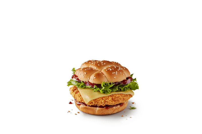 This burger is made up of 100% chicken breast fillet in a crispy, crunchy coating with a smoky BBQ sauce, cheddar cheese, red onion, lettuce, all in a delicious sourdough style sesame topped bun.