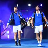 Andy Murray and Jamie Murray still plan on playing doubles together at Wimbledon.