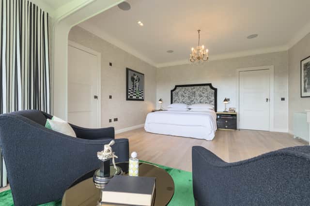 The principal bedroom suite has a bathroom and dressing room