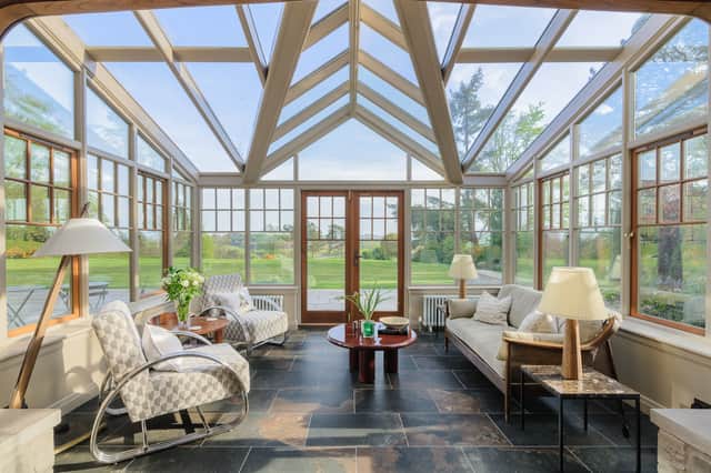 The stunning conservatory leads off the dining room