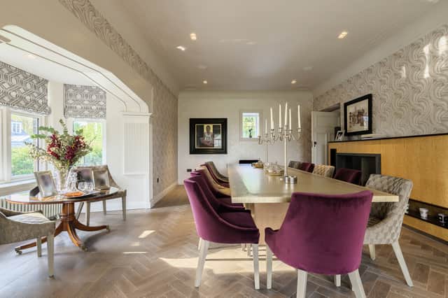 The formal dining room has a bay window
