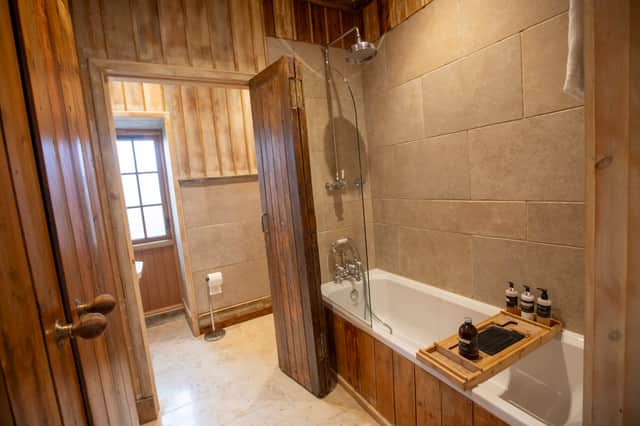 The bathroom is tucked discreetly at the back of the building